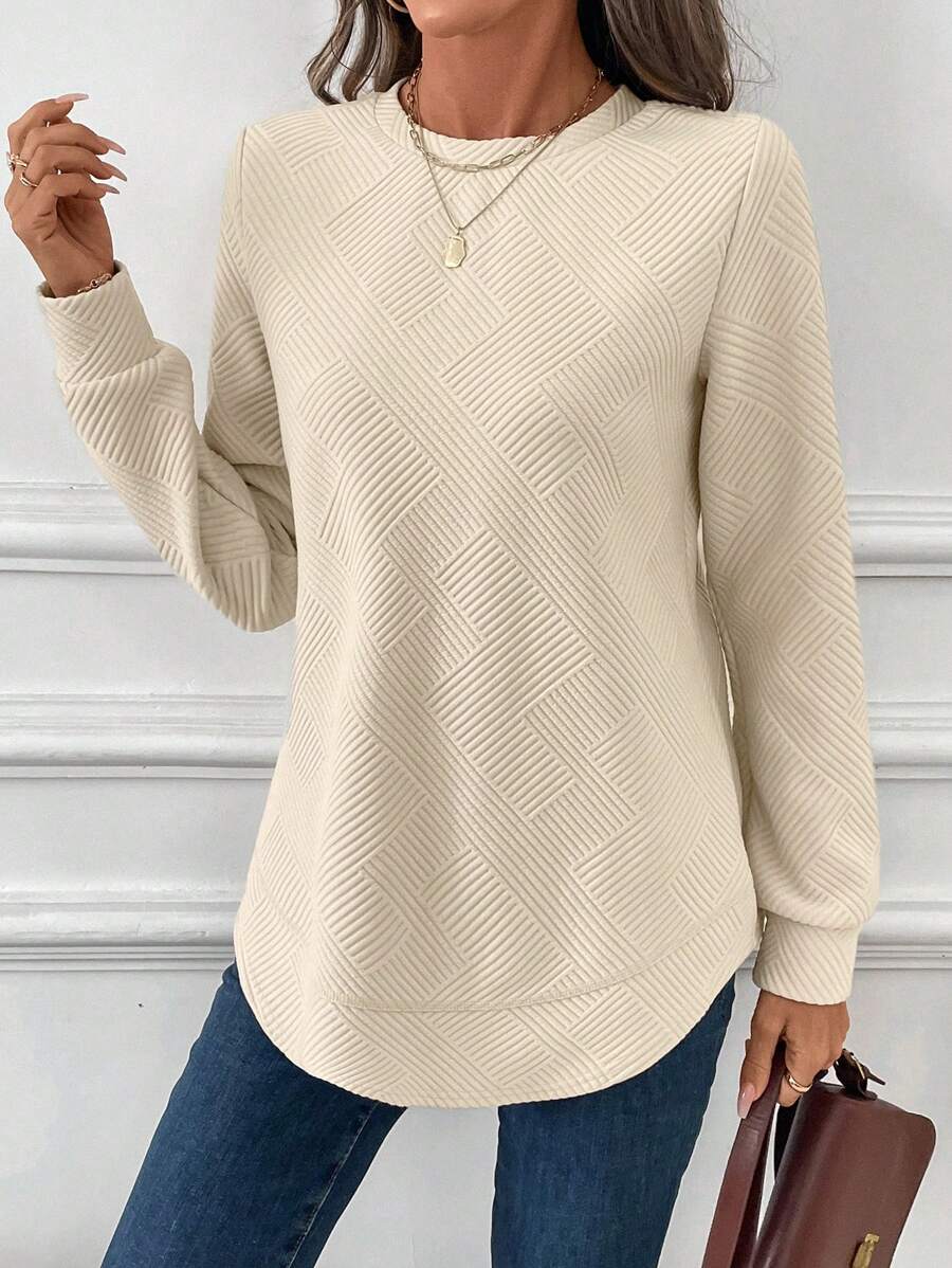 Blusa em Alto Relevo e Manga Longa
