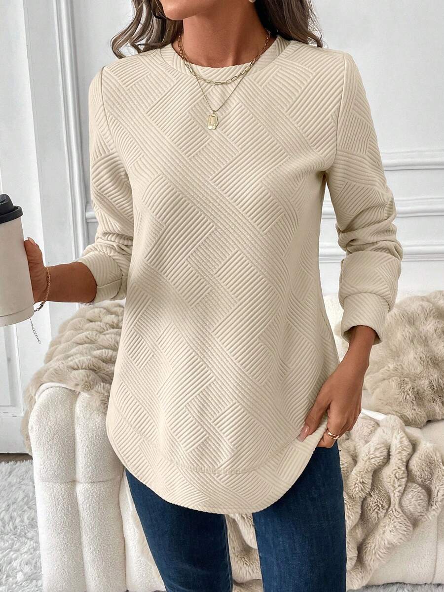 Blusa em Alto Relevo e Manga Longa