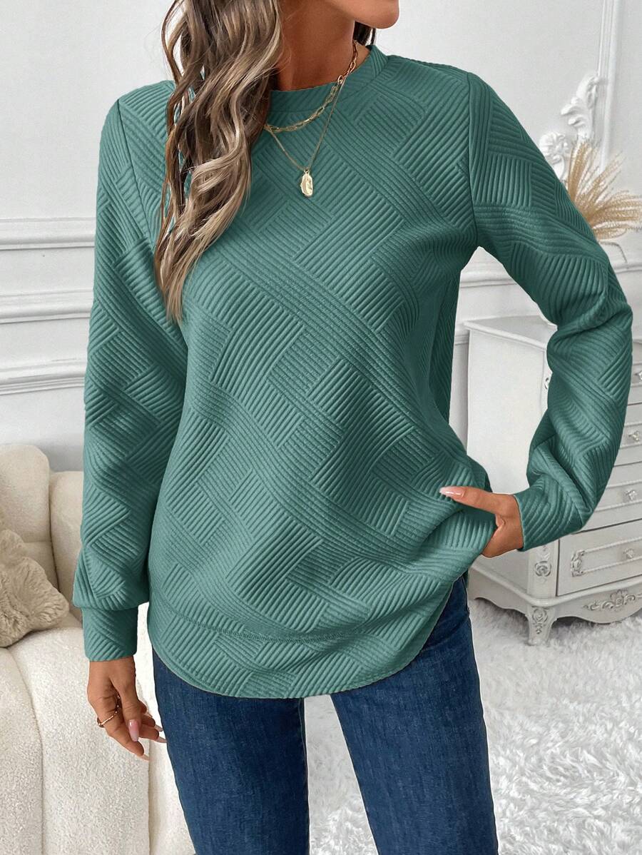 Blusa em Alto Relevo e Manga Longa