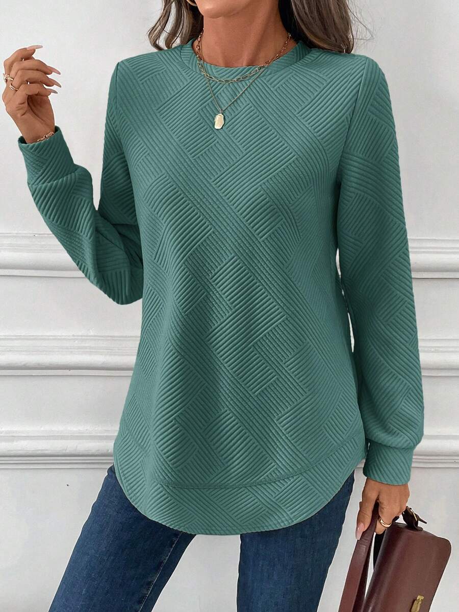 Blusa em Alto Relevo e Manga Longa