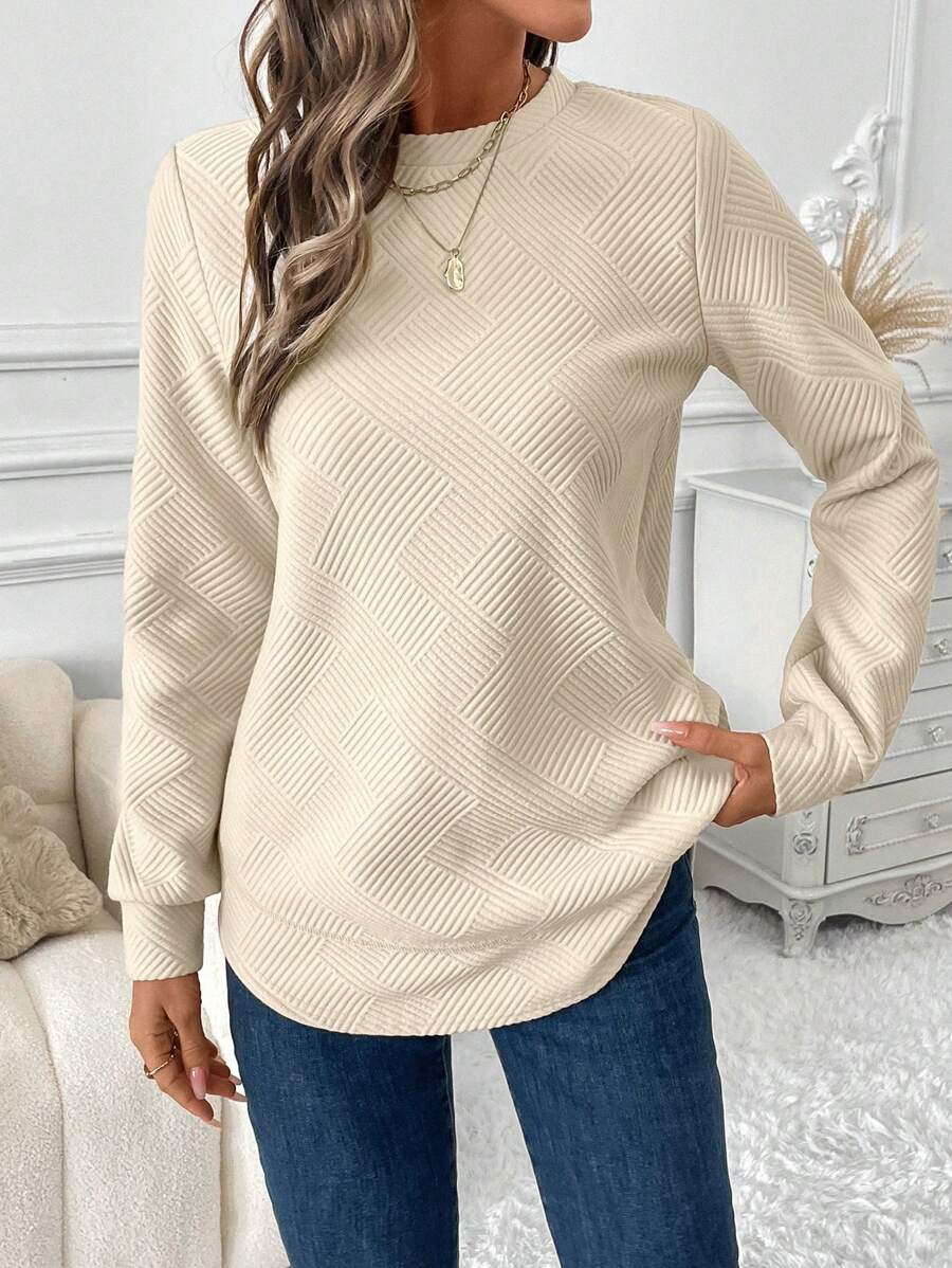 Blusa em Alto Relevo e Manga Longa