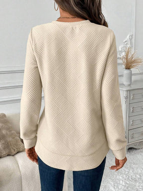 Blusa em Alto Relevo e Manga Longa
