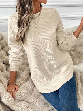 Blusa em Alto Relevo e Manga Longa