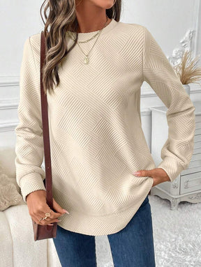Blusa em Alto Relevo e Manga Longa