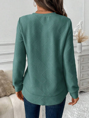 Blusa em Alto Relevo e Manga Longa