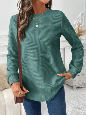 Blusa em Alto Relevo e Manga Longa