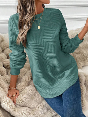 Blusa em Alto Relevo e Manga Longa